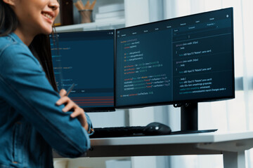 Young beautiful Asian IT developer l looking out to present with online information on pc with...
