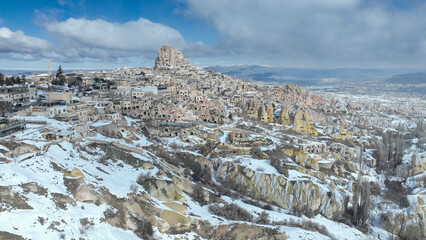 defaultOrtahisar Town at snowy day in Uchisar. A magical winter fairy tale.As winter tightens its grip in Turkey, Cappadocia&rsquo;s beautiful scenery under a blanket of new pristine snow mesmerizes visitor