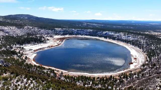 Aerial view of stoneman lake and winter forest, United States.