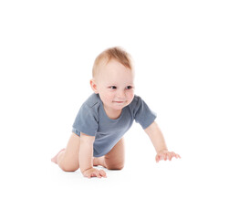 Cute little baby crawling on white background