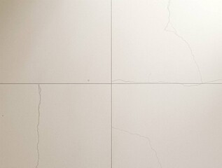 Cream-Colored Tiles with Subtle Veining: A Textural Background