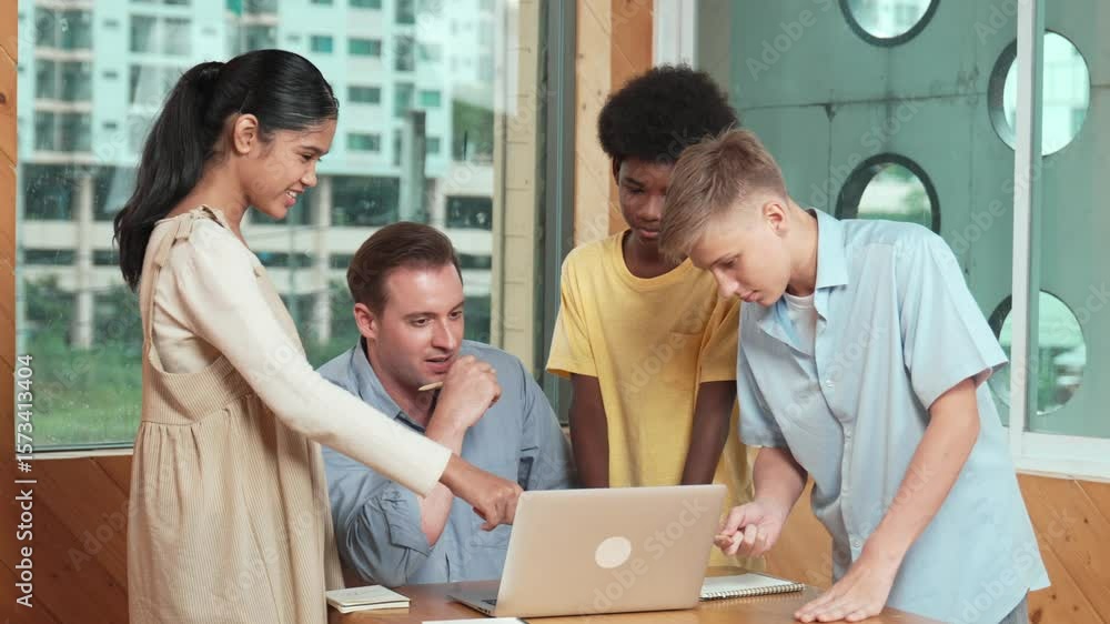 Poster high school boy presenting project while teacher looking at laptop. group of diverse student standin