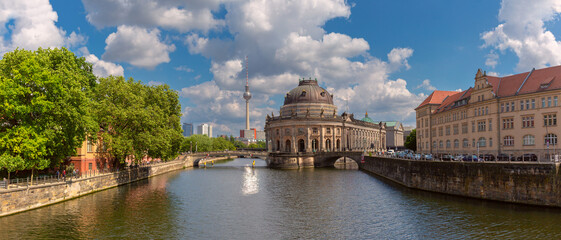 Riverside view of Museum Island in Berlin Germany with historic buildings and river Spree