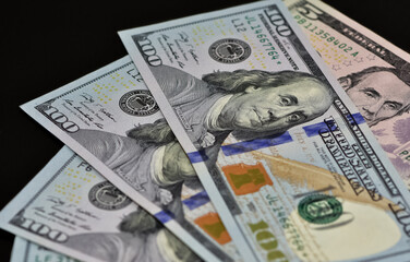 Images of banknotes from various countries. Photos of euros and US dollars.