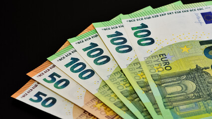 Images of banknotes from various countries. Photos of euros and US dollars.