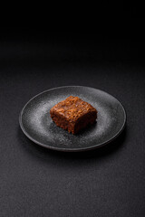 Chocolate brownie cake, food, sweet dessert with nuts rectangular shape. Sweet chocolate brownie