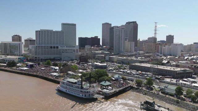 Aerial view of New Orleans riverfront skyline and Mississippi River steamboat