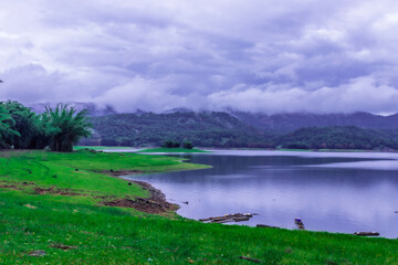 beautiful landscape scenery with lake and green forest mountain in kerala