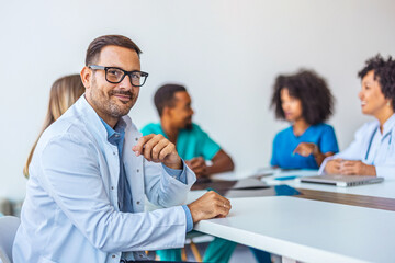 Group of Healthcare Professionals Collaborating in a Meeting Room Environment