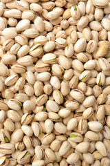 Pistachios texture and background . Tasty pistachios as background, as pistachios texture. Flat lay
