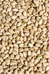 Pistachios texture and background . Tasty pistachios as background, as pistachios texture. Flat lay