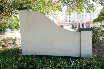 blank wall sign at entrance to a development