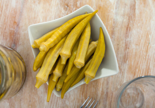 Traditional spanish cuisine, preserved okra on a plate, served in a cafe