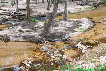 Photograph of the Capertee River at very low levels running through the Capertee Valley after major flood damage in the Wollemi National Park in NSW, Australia.