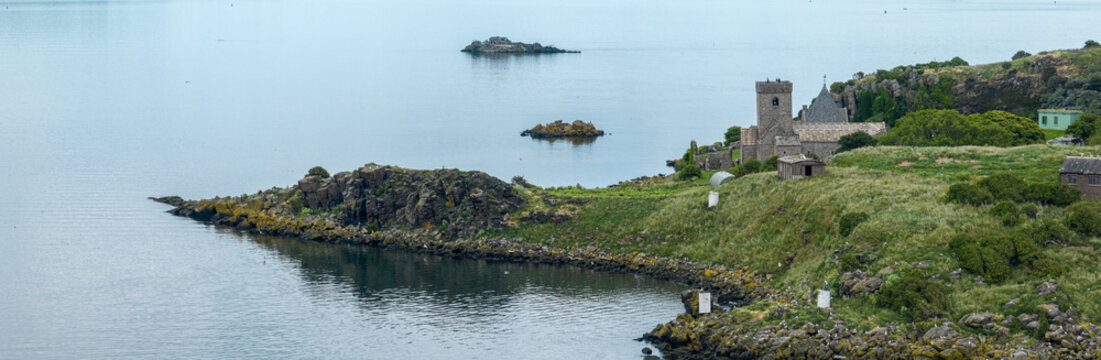 Aerial view of Inchcolm Abbey was established on this island originally as a priory by David I in 1140. It is the best-preserved group of monastic buildings in Scotland