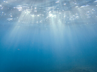 Ocean blue underwater with sunrays, Underwater Sea Deep Water Abstract Sunshine, sea wave , clean...