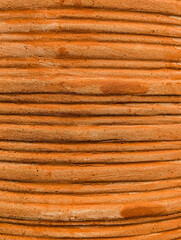 Close-up of the surface of a terracotta utensil.