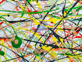 Abstract light background made of acrylic and latex paint. Green, red, yellow and black spots of...