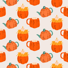 Seamless pattern with pumpkin-shaped mugs, teapots, and candles in cozy autumn style on light background. For fall designs, fabric prints, wrapping paper, kitchen textiles, packaging and scrapbooking.