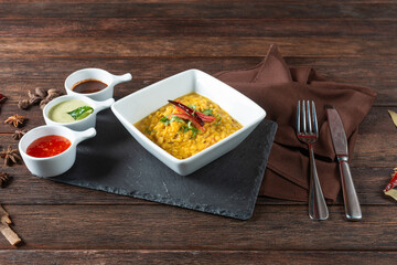 Curry Dish With Vibrant Sauces
