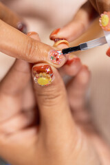 Nail art treatment at home nail salon enhances beauty and fashion with detailed designs and careful application for stylish and elegant look