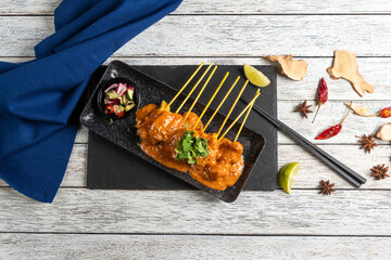 Savory Skewers Served With Zesty Dipping Sauce