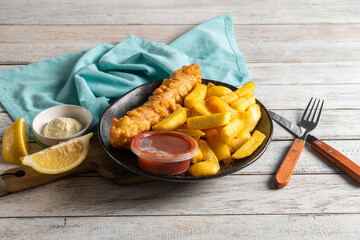 Tasty Fish & Chips With Lemon & Sauce