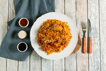 Delicious Chicken Rice Served With Savory Sauces