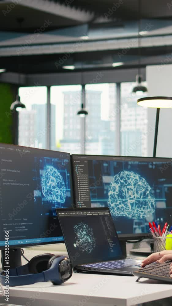 Poster vertical video female programmer in office integrating ai machine learning systems to streamline wor
