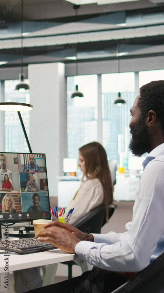 Poster vertical video tech startup office team collaborating via videocall, doing brainstorming on backup s