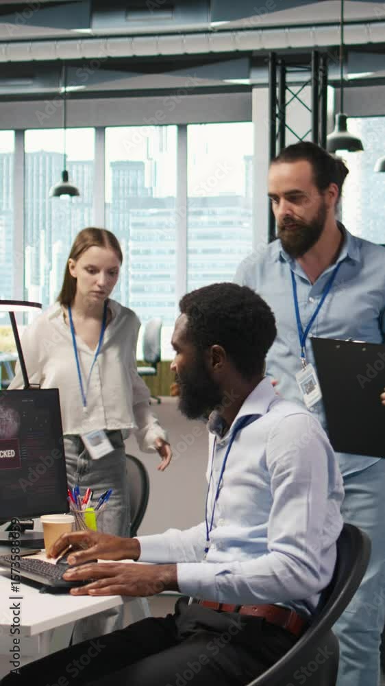 Poster vertical video programmer requests help from team leader to fix hacking attempt on corporate network