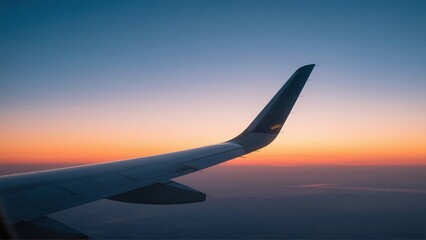 Fototapeta premium Stunning Sunset View from Airplane Wing Aerial Travel Photography