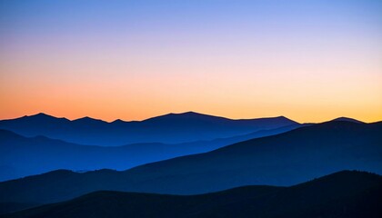 Serene Sunset over Majestic Mountain Ranges