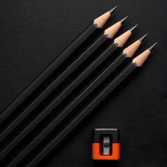 Minimalist top view of six black wooden pencils aligned next to a black and orange sharpener on a dark background, perfect for creative, educational, or design-related themes

