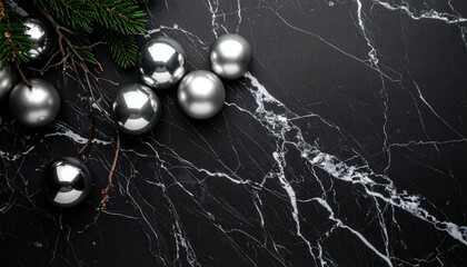 Chrome Spheres Embedded In Black Marble Surface With Green Foliage Accent Top View
