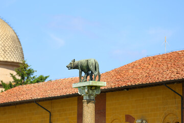 Statue of the she wolf suckling Romulus and Remus, the founders of ancient Rome (Roman Mythology) in Pisa, Italy.