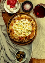 The best and most perfect pizza in the world, in portrait format, top view, and fine art. Chicken with catupiry cheese.