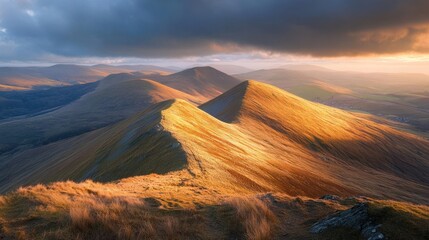 Golden sunlight bathes mountain ridges at sunset