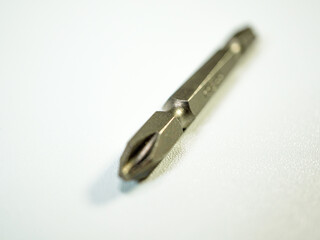 A close-up on a durable screwdriver bit, essential hardware tool for construction, DIY projects and...