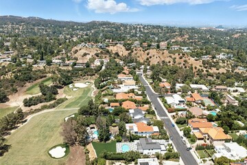Aerial Suburban Scene with Golf Course and Greenery