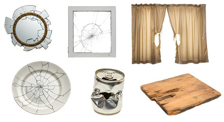 A collection of broken household items including a shattered mirror, cracked frame, and damaged curtains, showcasing wear and tear
