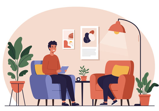 Smiling Man in Orange Sweater Holding Tablet in Blue Armchair.