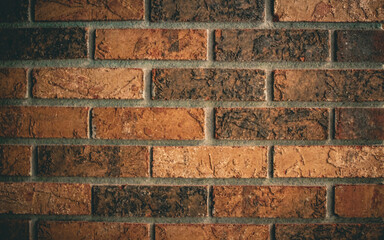 a traditional red brown brick wall background with copy space. abstract design element.