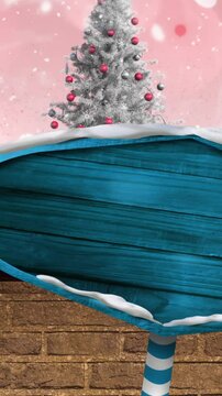 Animation of road sign with copy space over glowing spots and snow globe on pink background