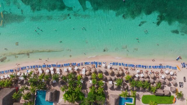Aerial footage captures Cozumels stunning beautypristine beaches, turquoise waters, and vibrant activities make it the ultimate tropical paradise getaway youve always dreamed of