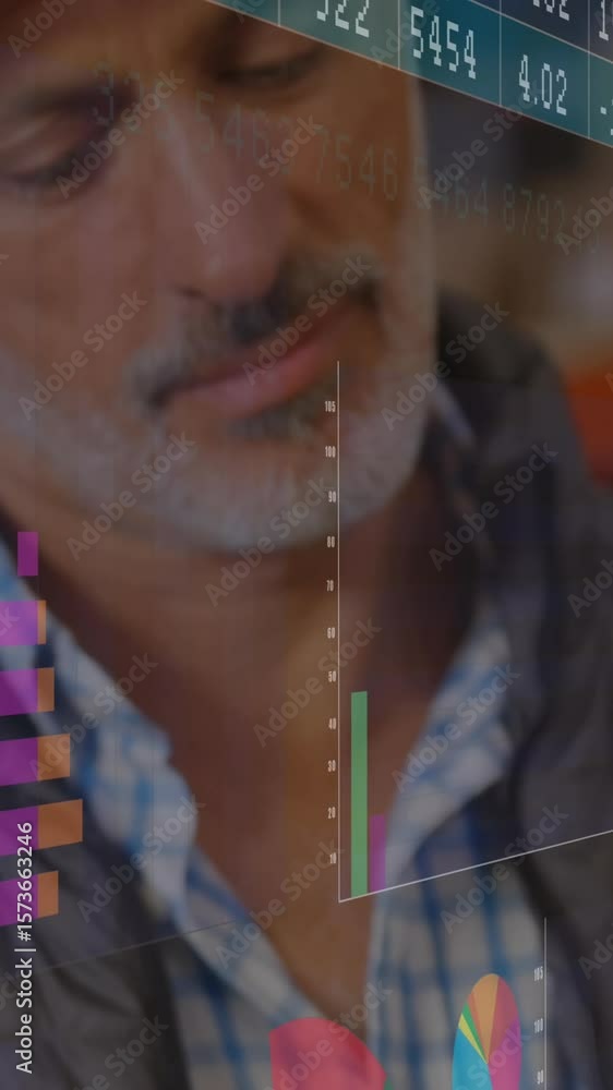 Poster animation of multiple graphs and numbers charts over caucasian man writing in notepad at warehouse