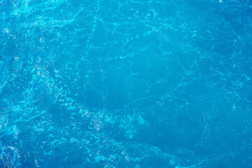 Vibrant Blue Ocean Surface with Turbulent Water and Subtle Waves