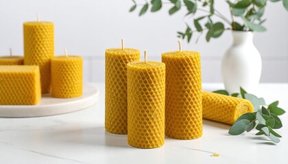 Honeycomb candles on a white surface