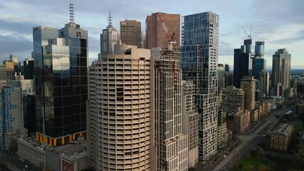 Melbourne, Australia - 01 March 2025: Aerial view of modern skyline at sunset, Australia.