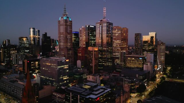 Aerial view of modern skyscrapers at night, Australia.